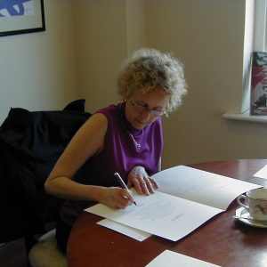 Aeronwy Thomas signing the colophon