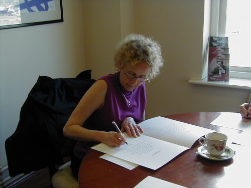 Aeronwy Thomas signing the colophon